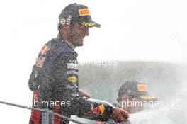 Mark Webber (AUS) Red Bull Racing celebrates his third position on the podium. 08.09.2013. Formula 1 World Championship, Rd 12, Italian Grand Prix, Monza, Italy, Race Day.