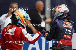 (L to R): Fernando Alonso (ESP) Ferrari congratulates race winner Sebastian Vettel (GER) Red Bull Racing in parc ferme. 08.09.2013. Formula 1 World Championship, Rd 12, Italian Grand Prix, Monza, Italy, Race Day.
