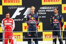 The podium (L to R): Fernando Alonso (ESP) Ferrari, second; Sebastian Vettel (GER) Red Bull Racing, race winner; Mark Webber (AUS) Red Bull Racing, third. 08.09.2013. Formula 1 World Championship, Rd 12, Italian Grand Prix, Monza, Italy, Race Day.