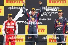 The podium (L to R): Fernando Alonso (ESP) Ferrari, second; Sebastian Vettel (GER) Red Bull Racing, race winner; Mark Webber (AUS) Red Bull Racing, third.. 08.09.2013. Formula 1 World Championship, Rd 12, Italian Grand Prix, Monza, Italy, Race Day.