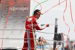 Fernando Alonso (ESP) Ferrari celebrates his second position on the podium. 08.09.2013. Formula 1 World Championship, Rd 12, Italian Grand Prix, Monza, Italy, Race Day.