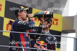 Race winner Sebastian Vettel (GER) Red Bull Racing celebrates on the podium. 08.09.2013. Formula 1 World Championship, Rd 12, Italian Grand Prix, Monza, Italy, Race Day.