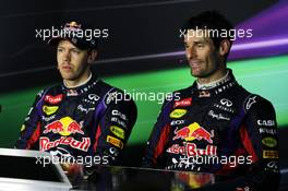 (L to R): Race winner Sebastian Vettel (GER) Red Bull Racing and team mate Mark Webber (AUS) Red Bull Racing in the FIA Press Conference. 08.09.2013. Formula 1 World Championship, Rd 12, Italian Grand Prix, Monza, Italy, Race Day.