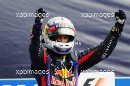 Race winner Sebastian Vettel (GER) Red Bull Racing celebrates in parc ferme. 08.09.2013. Formula 1 World Championship, Rd 12, Italian Grand Prix, Monza, Italy, Race Day.