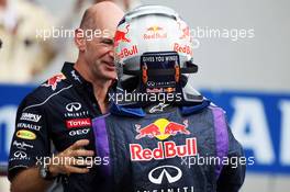 (L to R): Adrian Newey (GBR) Red Bull Racing Chief Technical Officer celebrates with race winner Sebastian Vettel (GER) Red Bull Racing in parc ferme. 08.09.2013. Formula 1 World Championship, Rd 12, Italian Grand Prix, Monza, Italy, Race Day.