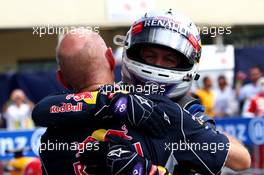 1st place Sebastian Vettel (GER) Red Bull Racing and Adrian Newey (GBR) Red Bull Racing Chief Technical Officer. 08.09.2013. Formula 1 World Championship, Rd 12, Italian Grand Prix, Monza, Italy, Race Day.