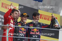 The podium (L to R): Fernando Alonso (ESP) Ferrari, second; Adrian Newey (GBR) Red Bull Racing Chief Technical Officer; Sebastian Vettel (GER) Red Bull Racing, race winner; Mark Webber (AUS) Red Bull Racing, third. 08.09.2013. Formula 1 World Championship, Rd 12, Italian Grand Prix, Monza, Italy, Race Day.