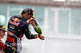 Mark Webber (AUS) Red Bull Racing celebrates his third position on the podium. 08.09.2013. Formula 1 World Championship, Rd 12, Italian Grand Prix, Monza, Italy, Race Day.