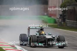 Lewis Hamilton (GBR) Mercedes AMG F1 W04 locks up under braking. 08.09.2013. Formula 1 World Championship, Rd 12, Italian Grand Prix, Monza, Italy, Race Day.