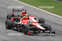 Max Chilton (GBR) Marussia F1 Team MR02 and team mate Jules Bianchi (FRA) Marussia F1 Team MR02 battle for position. 08.09.2013. Formula 1 World Championship, Rd 12, Italian Grand Prix, Monza, Italy, Race Day.