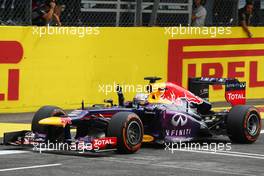 Race winner Sebastian Vettel (GER) Red Bull Racing RB9 celebrates at the end of the race. 08.09.2013. Formula 1 World Championship, Rd 12, Italian Grand Prix, Monza, Italy, Race Day.
