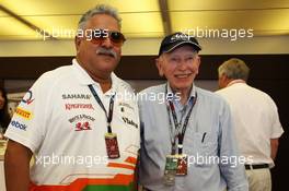 (L to R): Dr. Vijay Mallya (IND) Sahara Force India F1 Team Owner with John Surtees (GBR). 07.09.2013. Formula 1 World Championship, Rd 12, Italian Grand Prix, Monza, Italy, Qualifying Day.