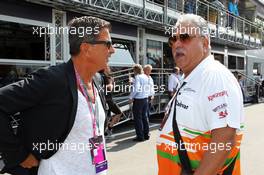 (L to R): Enrico Zanarini (ITA) Driver Manager with Dr. Vijay Mallya (IND) Sahara Force India F1 Team Owner. 07.09.2013. Formula 1 World Championship, Rd 12, Italian Grand Prix, Monza, Italy, Qualifying Day.