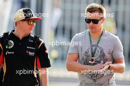 Kimi Raikkonen (FIN) Lotus F1 Team with Toni Vilander (FIN). 07.09.2013. Formula 1 World Championship, Rd 12, Italian Grand Prix, Monza, Italy, Qualifying Day.