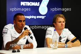 (L to R): Lewis Hamilton (GBR) Mercedes AMG F1 with team mate Nico Rosberg (GER) Mercedes AMG F1. 07.09.2013. Formula 1 World Championship, Rd 12, Italian Grand Prix, Monza, Italy, Qualifying Day.
