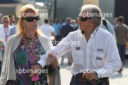 Jackie Stewart (GBR) with his wife Helen Stewart (GBR). 07.09.2013. Formula 1 World Championship, Rd 12, Italian Grand Prix, Monza, Italy, Qualifying Day.