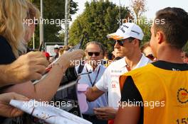 Adrian Sutil (GER) Sahara Force India F1 signs autographs for the fans. 07.09.2013. Formula 1 World Championship, Rd 12, Italian Grand Prix, Monza, Italy, Qualifying Day.