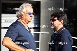 (L to R): Flavio Briatore (ITA) with Luis Garcia Abad (ESP) Driver Manager of Fernando Alonso (ESP) Ferrari. 07.09.2013. Formula 1 World Championship, Rd 12, Italian Grand Prix, Monza, Italy, Qualifying Day.