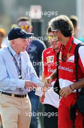 (L to R): John Surtees (GBR) with Fernando Alonso (ESP) Ferrari and Edoardo Bendinelli (ITA) Personal Trainer. 07.09.2013. Formula 1 World Championship, Rd 12, Italian Grand Prix, Monza, Italy, Qualifying Day.