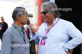 (L to R): Hiroshi Yasukawa (JPN) Dorna Sports Adviser with Max Damiani (ITA) Pirelli F1 Chief Engineer Co-ordinator. 07.09.2013. Formula 1 World Championship, Rd 12, Italian Grand Prix, Monza, Italy, Qualifying Day.