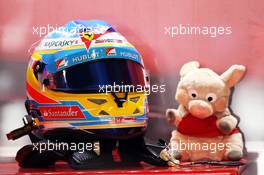 The helmet and mascot of Fernando Alonso (ESP) Ferrari. 07.09.2013. Formula 1 World Championship, Rd 12, Italian Grand Prix, Monza, Italy, Qualifying Day.