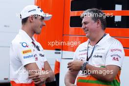 (L to R): Adrian Sutil (GER) Sahara Force India F1 with Otmar Szafnauer (USA) Sahara Force India F1 Chief Operating Officer. 07.09.2013. Formula 1 World Championship, Rd 12, Italian Grand Prix, Monza, Italy, Qualifying Day.