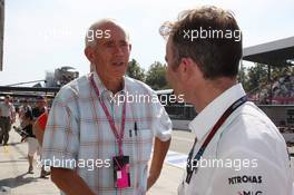 (L to R): Rory Byrne (RSA) with Paddy Lowe (GBR) Mercedes AMG F1 Executive Director (Technical). 07.09.2013. Formula 1 World Championship, Rd 12, Italian Grand Prix, Monza, Italy, Qualifying Day.
