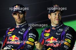 (L to R): Mark Webber (AUS) Red Bull Racing and team mate Sebastian Vettel (GER) Red Bull Racing in the FIA Press Conference. 07.09.2013. Formula 1 World Championship, Rd 12, Italian Grand Prix, Monza, Italy, Qualifying Day.