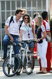 Toto Wolff (GER) Mercedes AMG F1 Shareholder and Executive Director and his wife Susie Wolff (GBR) Williams FW35 Development Driver (Right). 07.09.2013. Formula 1 World Championship, Rd 12, Italian Grand Prix, Monza, Italy, Qualifying Day.