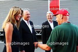 Ron Dennis (GBR) McLaren Executive Chairman (Left) with Niki Lauda (AUT) Mercedes Non-Executive Chairman (Right) and Caroline Weatherall (GBR). 07.09.2013. Formula 1 World Championship, Rd 12, Italian Grand Prix, Monza, Italy, Qualifying Day.