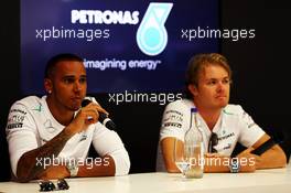 (L to R): Lewis Hamilton (GBR) Mercedes AMG F1 with team mate Nico Rosberg (GER) Mercedes AMG F1. 07.09.2013. Formula 1 World Championship, Rd 12, Italian Grand Prix, Monza, Italy, Qualifying Day.