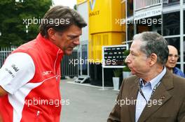 (L to R): Graeme Lowdon (GBR) Marussia F1 Team Chief Executive Officer with Jean Todt (FRA) FIA President. 08.09.2013. Formula 1 World Championship, Rd 12, Italian Grand Prix, Monza, Italy, Race Day.
