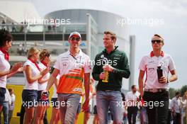 (L to R): Adrian Sutil (GER) Sahara Force India F1, Giedo van der Garde (NLD) Caterham F1 Team and Max Chilton (GBR) Marussia F1 Team on the drivers parade. 08.09.2013. Formula 1 World Championship, Rd 12, Italian Grand Prix, Monza, Italy, Race Day.