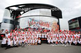 The McLaren team celebrate 50 years as a constructor. 08.09.2013. Formula 1 World Championship, Rd 12, Italian Grand Prix, Monza, Italy, Race Day.