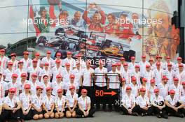 The McLaren team celebrate 50 years as a constructor. 08.09.2013. Formula 1 World Championship, Rd 12, Italian Grand Prix, Monza, Italy, Race Day.