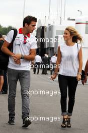 Jules Bianchi (FRA) Marussia F1 Team with girlfriend Camille Marchetti (FRA). 08.09.2013. Formula 1 World Championship, Rd 12, Italian Grand Prix, Monza, Italy, Race Day.