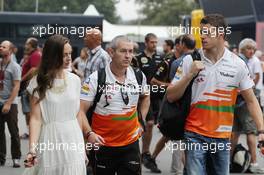 Paul di Resta (GBR) Sahara Force India F1 with girlfriend Laura Jordan (GBR) and Gerry Convy (GBR) Personal Trainer. 08.09.2013. Formula 1 World Championship, Rd 12, Italian Grand Prix, Monza, Italy, Race Day.