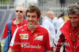 Fernando Alonso (ESP) Ferrari with Edoardo Bendinelli (ITA) Personal Trainer. 08.09.2013. Formula 1 World Championship, Rd 12, Italian Grand Prix, Monza, Italy, Race Day.