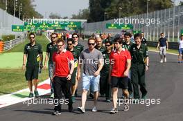 Adam Carroll (GBR) (Centre) walks the circuit. 05.09.2013. Formula 1 World Championship, Rd 12, Italian Grand Prix, Monza, Italy, Preparation Day.