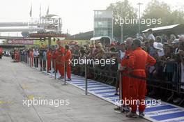 Fans in the pit lane. 05.09.2013. Formula 1 World Championship, Rd 12, Italian Grand Prix, Monza, Italy, Preparation Day.