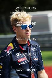 Sebastian Vettel (GER) Red Bull Racing walks the circuit. 05.09.2013. Formula 1 World Championship, Rd 12, Italian Grand Prix, Monza, Italy, Preparation Day.