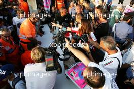 Fernando Alonso (ESP) Ferrari signs autographs for the fans. 05.09.2013. Formula 1 World Championship, Rd 12, Italian Grand Prix, Monza, Italy, Preparation Day.
