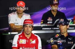 (L to R): Fernando Alonso (ESP) Ferrari and Mark Webber (AUS) Red Bull Racing in the FIA Press Conference. 05.09.2013. Formula 1 World Championship, Rd 12, Italian Grand Prix, Monza, Italy, Preparation Day.