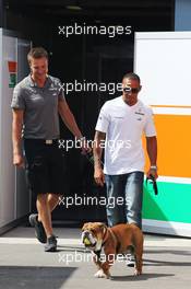 Lewis Hamilton (GBR) Mercedes AMG F1 with his dog Roscoe. 05.09.2013. Formula 1 World Championship, Rd 12, Italian Grand Prix, Monza, Italy, Preparation Day.