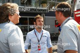 Luca Filippi (ITA) Sky Sports F1 TV Presenter (Centre) with Mario Isola (ITA) Pirelli Racing Manager (Right). 05.09.2013. Formula 1 World Championship, Rd 12, Italian Grand Prix, Monza, Italy, Preparation Day.