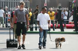 Lewis Hamilton (GBR) Mercedes AMG F1 with his dog Roscoe. 05.09.2013. Formula 1 World Championship, Rd 12, Italian Grand Prix, Monza, Italy, Preparation Day.
