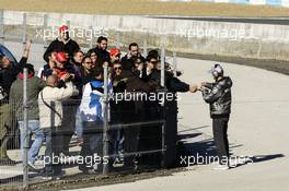 Nico Rosberg (GER) Mercedes AMG F1 signs autographs for the fans. 08.02.2013. Formula One Testing, Day Four, Jerez, Spain.
