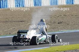 Nico Rosberg (GER) Mercedes AMG F1 W04 stops on the circuit with a small fire. 05.02.2013. Formula One Testing, Day One, Jerez, Spain.