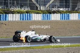 Nico Rosberg (GER) Mercedes AMG F1 W04 stops on the circuit with a small fire. 05.02.2013. Formula One Testing, Day One, Jerez, Spain.