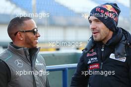 (L to R): Lewis Hamilton (GBR) Mercedes AMG F1 with Jean-Eric Vergne (FRA) Scuderia Toro Rosso. 05.02.2013. Formula One Testing, Day One, Jerez, Spain.